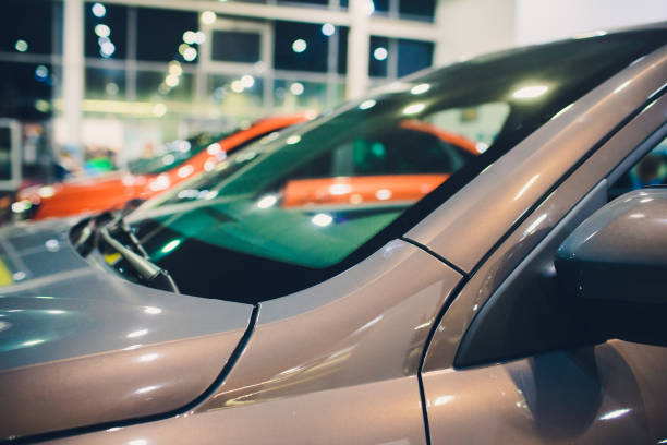 View of row new car at new car showroom. View of row new car at new car showroom showroom photos stock pictures, royalty-free photos & images