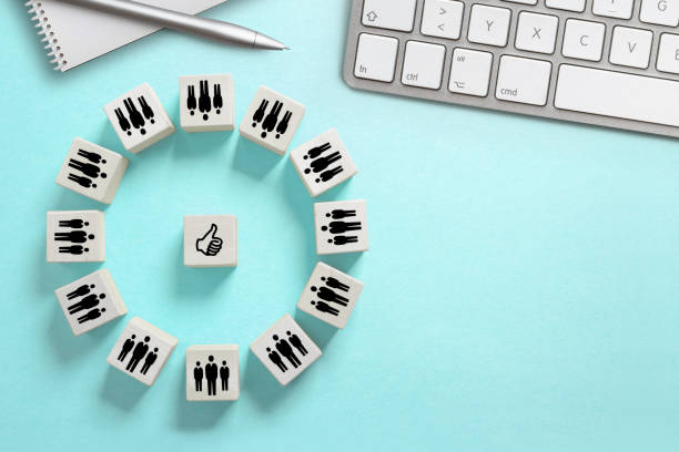 istock many people together agreeing to something symbolized by icons on cubes 1130382961