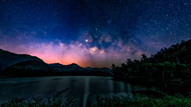 istock Milky Way and starry night sky. 1130391793