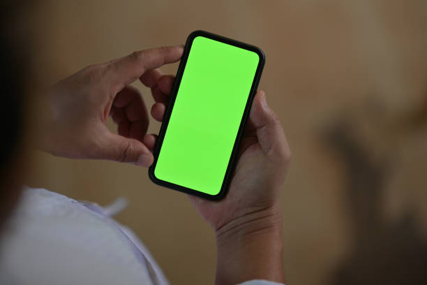 istock Top view of Man standing and using mobile smart phone 1130395223