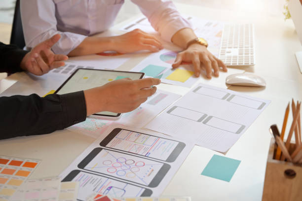 istock Cropped shot of team designers drawing website UX UI app development 1130395265