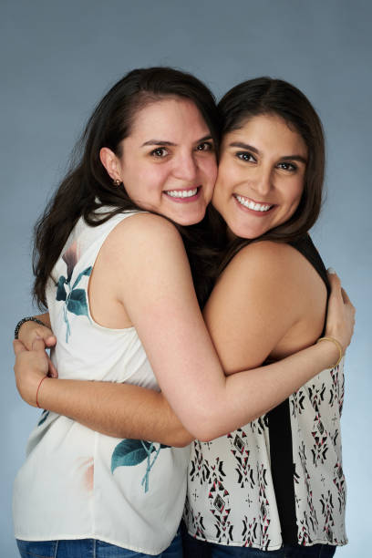 istock Pretty smiling girls 1130396083