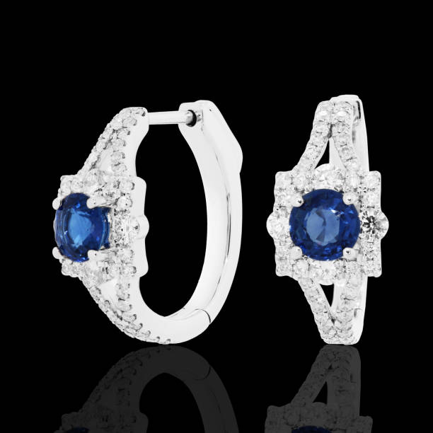 istock earrings with blue sapphire and  diamonds 1130396769
