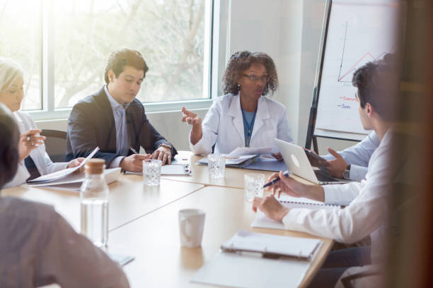 istock Doctor discusses something with hospital management 1130406796