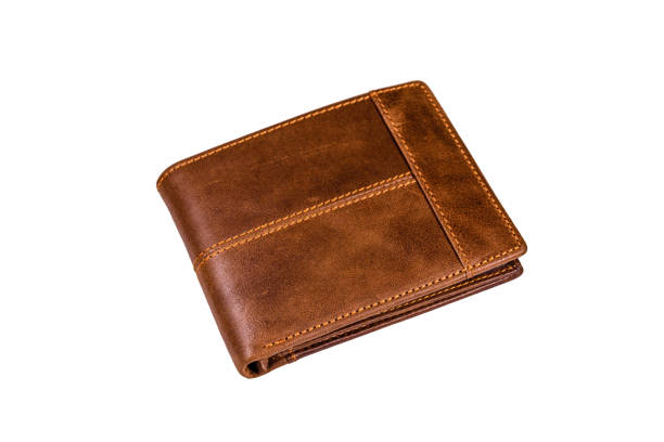 istock Closed brown leather wallet isolated on a white background 1130407874