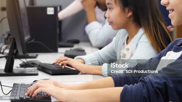 Student Tipe Computer Elementary Age Students Type In Computer Lab Stock Photo - Download ...