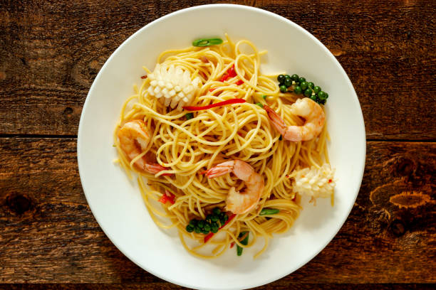 istock spicy spaghetti with seafood on plate. 1130410128