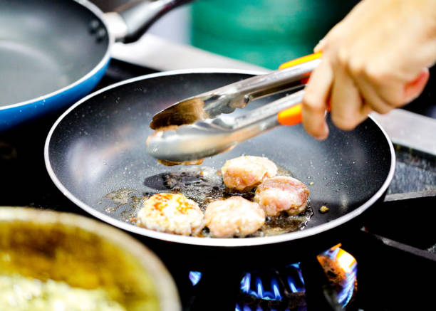 istock Chef preparing food, meal, in the kitchen, chef cooking, Chef decorating dish 1130411173