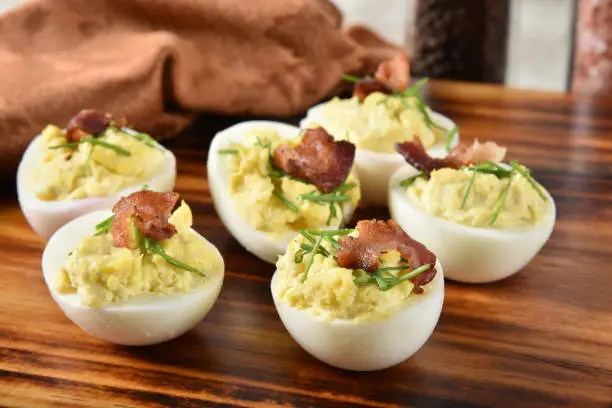 Deviled eggs with chives and bacon bits