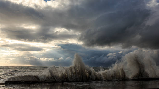 istock Storm waves over a pier in the Adler, Sochi 1130414453