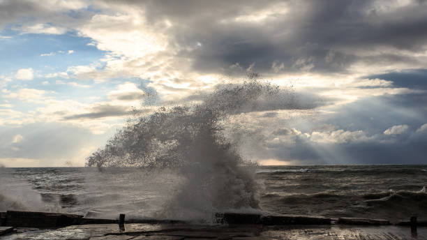 istock Storm waves over a pier in the Adler, Sochi 1130414463