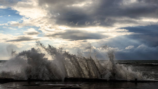 istock Storm waves over a pier in the Adler, Sochi 1130414464