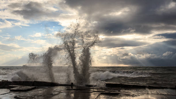 istock Storm waves over a pier in the Adler, Sochi 1130414466