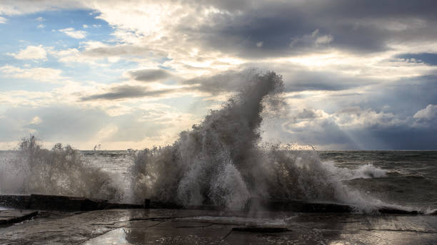 istock Storm waves over a pier in the Adler, Sochi 1130414470