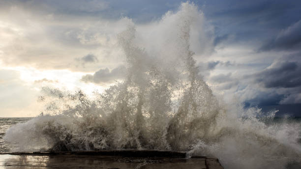 istock Storm waves over a pier in the Adler, Sochi 1130414480