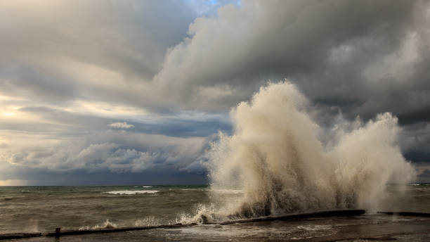 istock Storm waves over a pier in the Adler, Sochi 1130414482