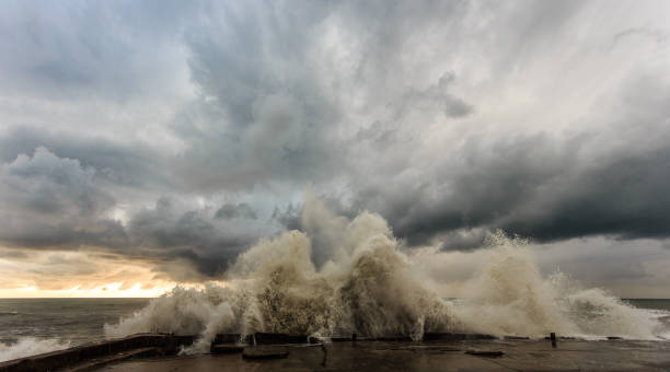 istock Storm waves over a pier in the Adler, Sochi 1130414527