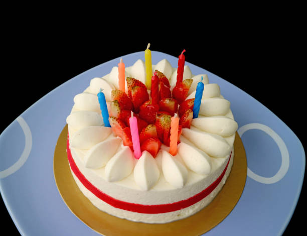 istock Strawberry Vanilla Short Cake with Multi-color Candles Preparing for the Celebration 1130416092
