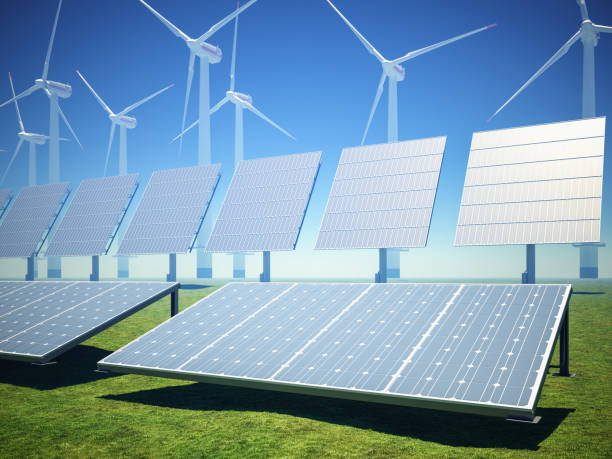 istock Solar panels with wind turbine 1130417452