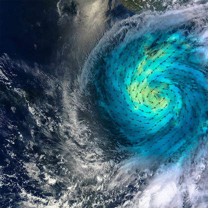 Huracán con la dirección de la velocidad del viento agregada scheem. Los tonos de verde azulado indican el rango de velocidades, con tonos más claros que representan vientos superficiales más fuertes. Elementos de esta imagen facilitados por la NASA. photo