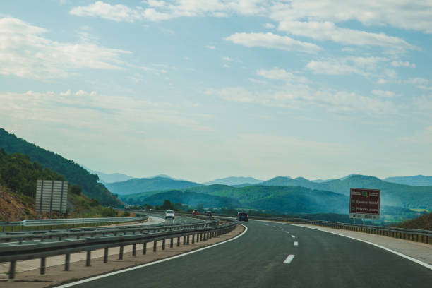 summer time road trip. speedway in mountains. car travel
