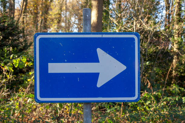istock sign direction of traffic on the road 1130426569