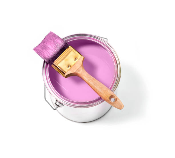 istock Pink paint tin can with brush on top on a white background with pink strokes 1130426636