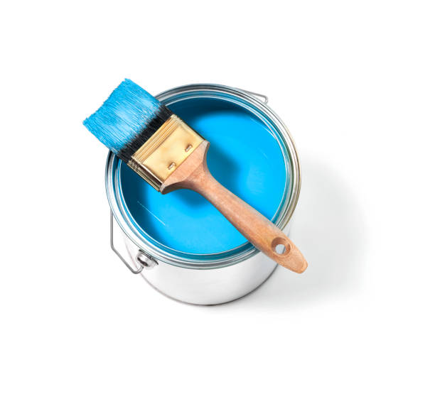 istock Blue paint in tin can with brush on top on a white background 1130426675