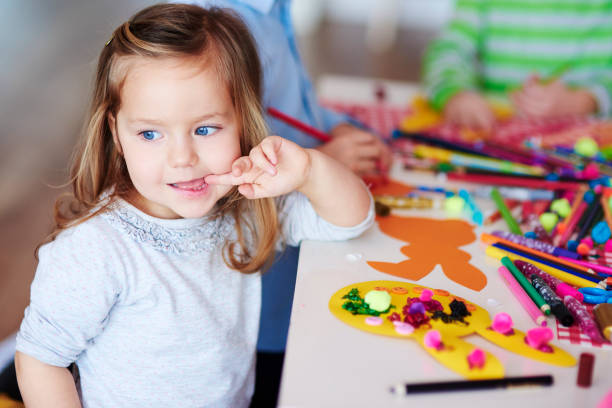 istock Adorable girl on art class 1130429580