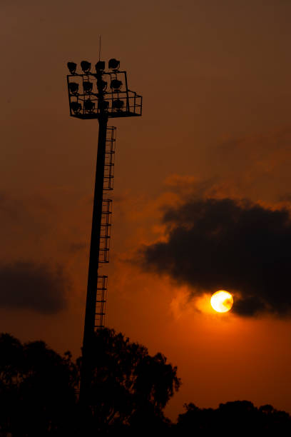 istock Spotlight of the stadium with Sun rises. 1130430726