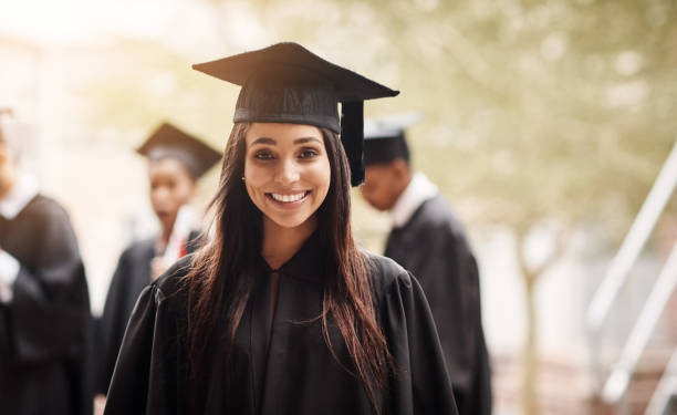 She achieved what she wanted to achieve Portrait of a female student on graduation day from university graduation photos stock pictures, royalty-free photos & images