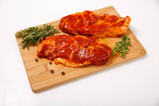 istock Meat steak for grilling in the marinade. 1130437475