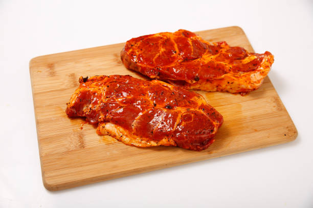 istock Meat steak for grilling in the marinade. 1130437551