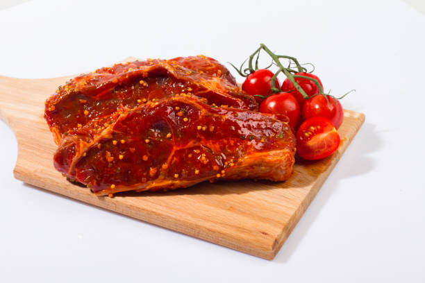 istock Meat steak for grilling in the marinade. 1130437630