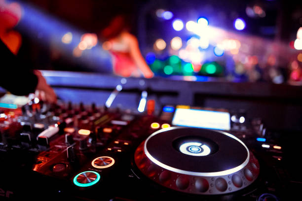 istock DJ playing music at mixer closeup 1130438806