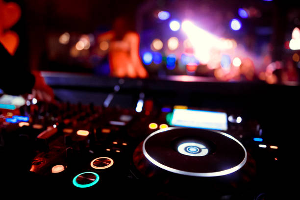istock DJ playing music at mixer closeup 1130438810