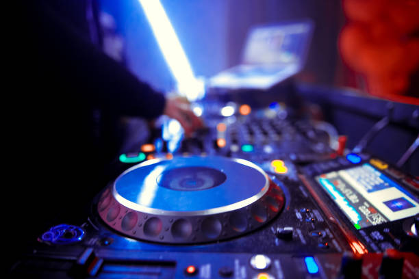 istock DJ playing music at mixer closeup 1130438812