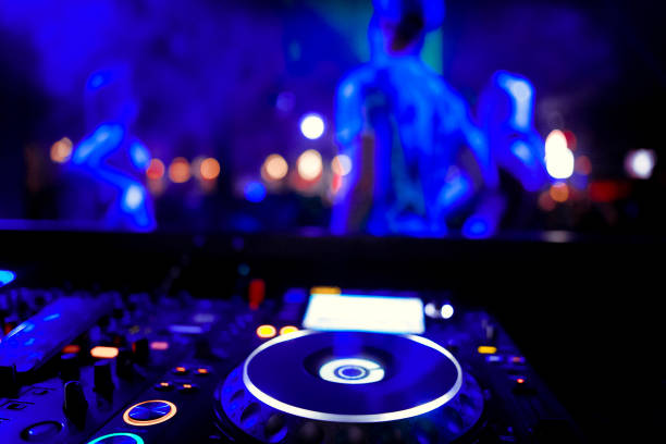 istock DJ playing music at mixer closeup 1130438818