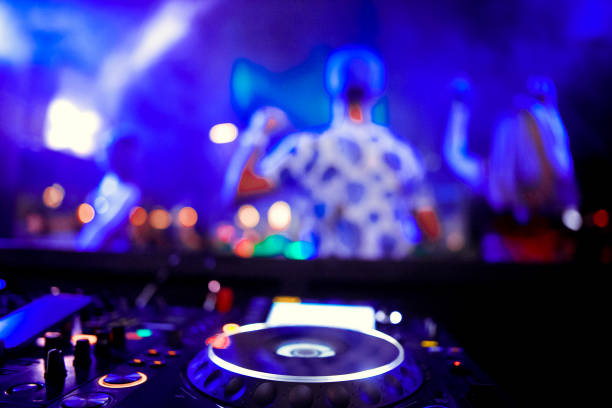 istock DJ playing music at mixer closeup 1130438822