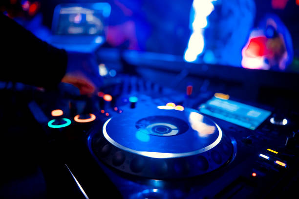 istock DJ playing music at mixer closeup 1130438855