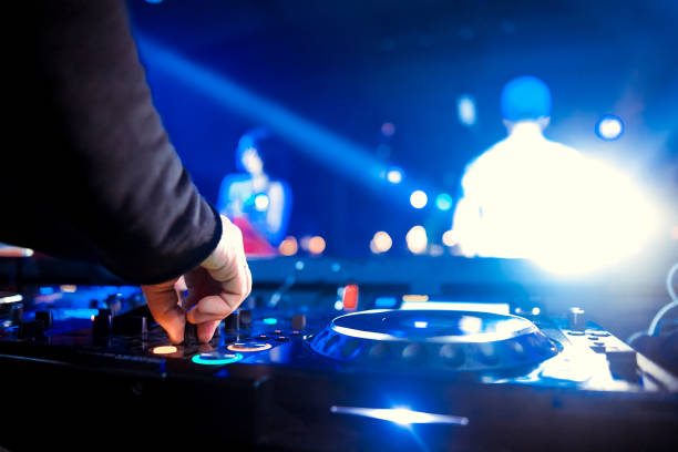 istock DJ playing music at mixer closeup 1130438864