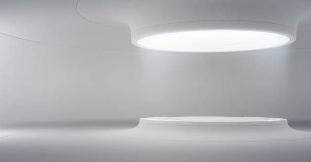 istock Abstract interior design of modern showroom with empty white floor and curved concrete wall background, Podium for product display in future architecture or spaceship. 1130439439