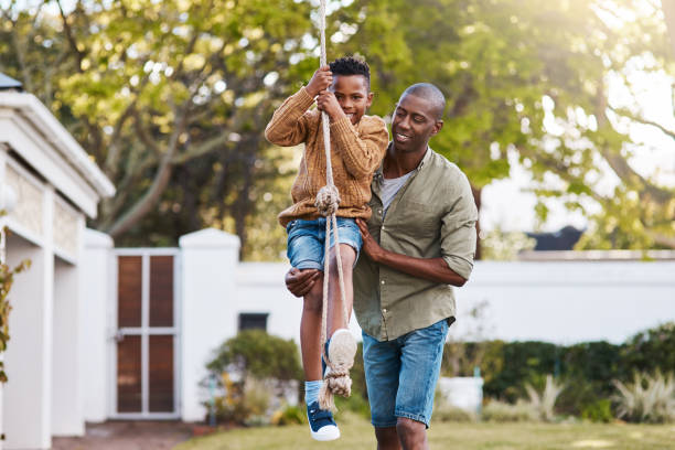 istock Hold on tight and Daddy will swing you gently 1130442669