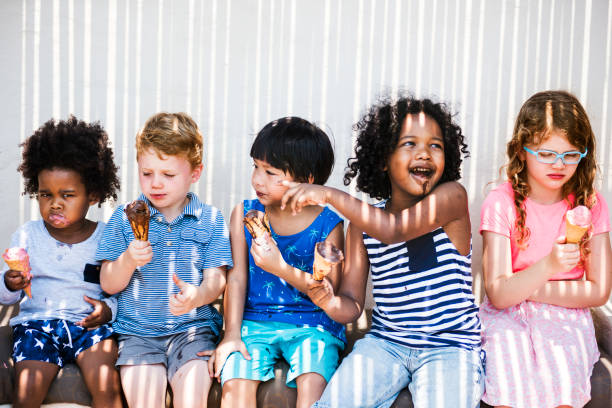 istock Kids eating ice cream in the summer 1130442823