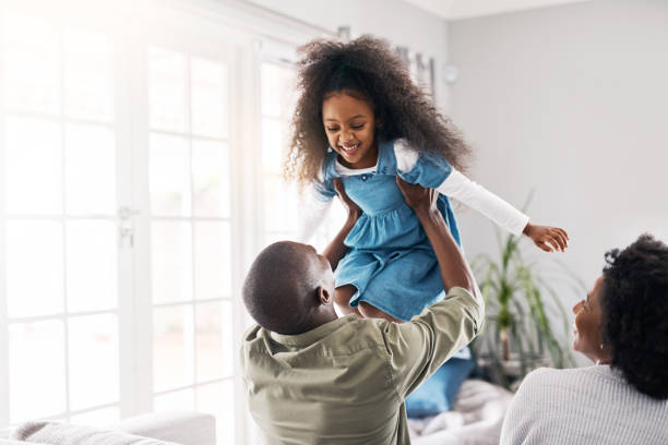 istock Her laughter fills their home with love 1130443134