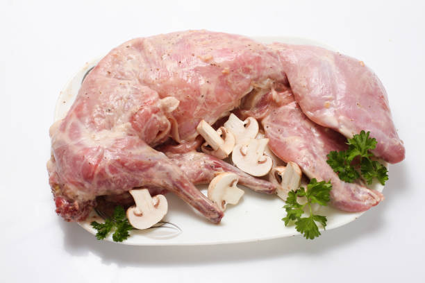 Rabbit meat on a wooden Board.
