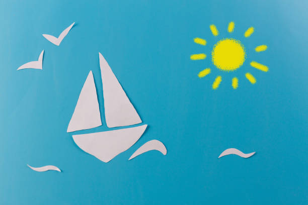 beach with palm trees and a sailing boat . paper cut