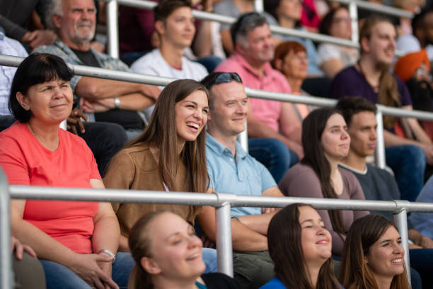 istock Group of spectators cheering in stadium 1130450636