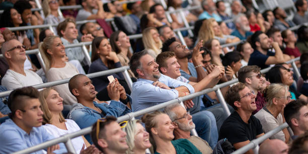 istock Group of spectators cheering in stadium 1130450639