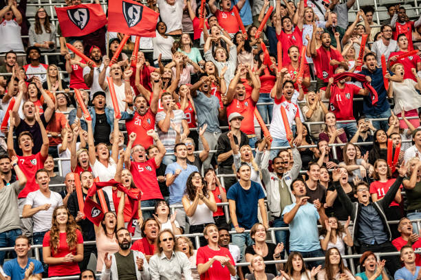 istock Group of spectators cheering in stadium 1130450692
